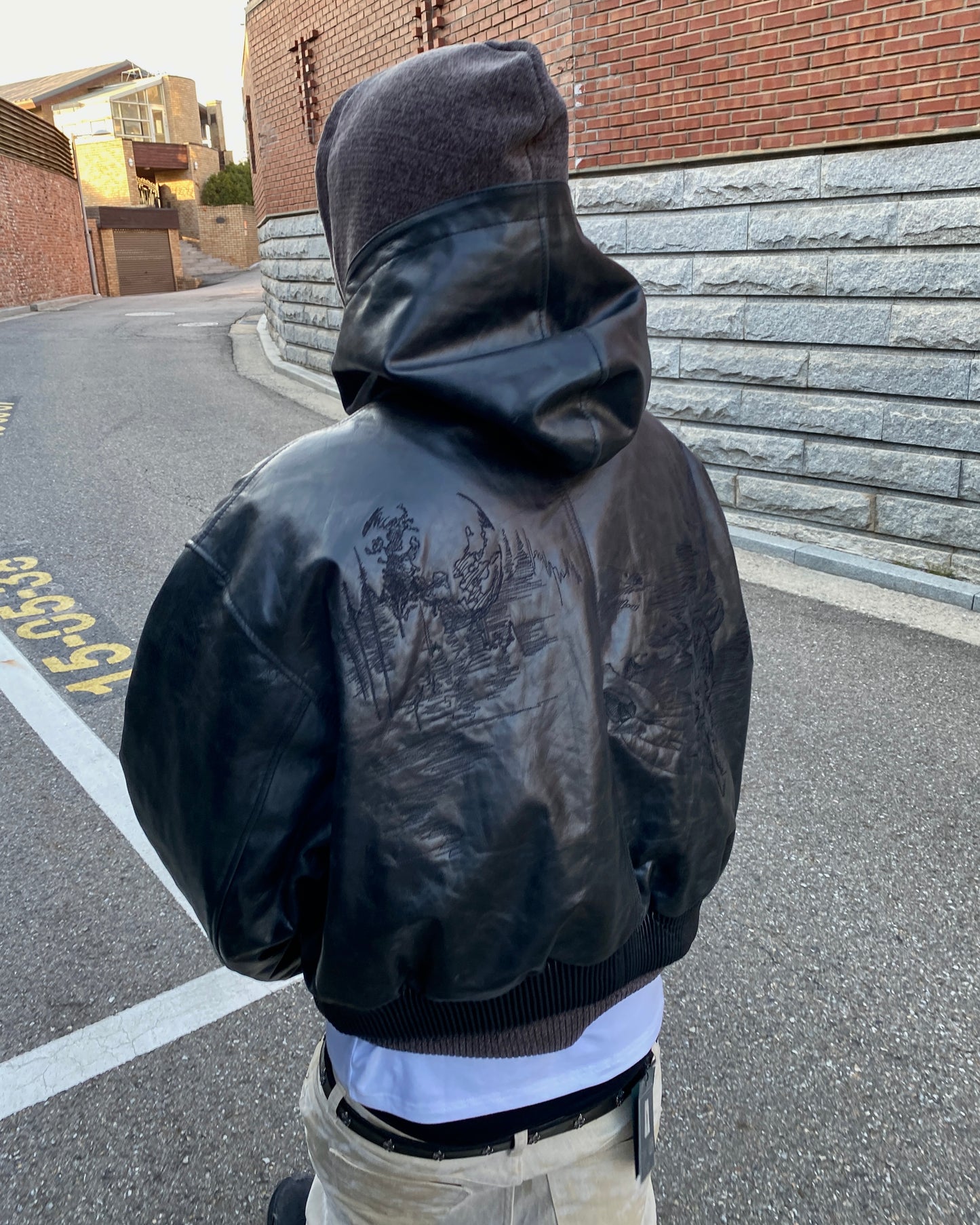 Undermycar LONE WOLF WITH CRESCENT MOON EMBROIDERED LEATHER HOODED BOMBER